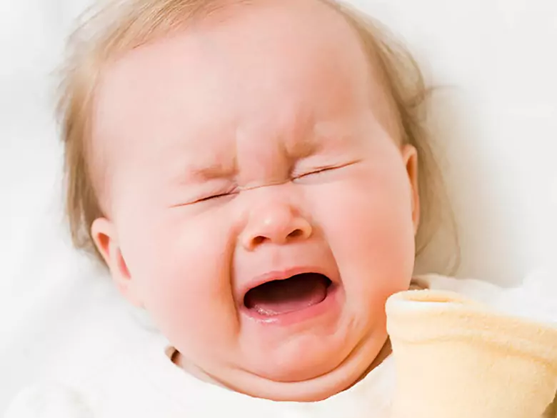 Schlürfendes Erbrechen bei einem Säugling